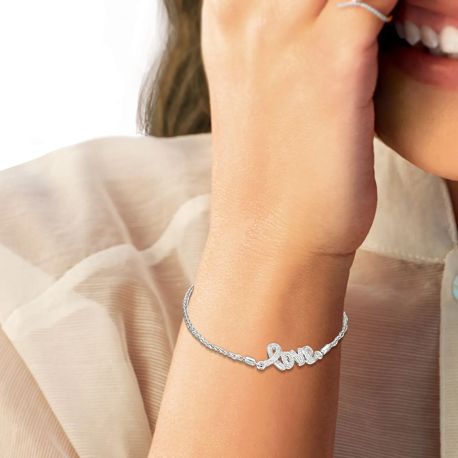 Jewelili Sterling Silver with 1/10 CTTW Round Shape Natural White Diamonds Love Bolo Bracelet, 9.5"